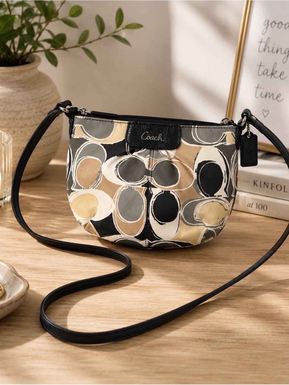 Coach Printed Oval Canvas Crossbody Bag in Black and Tan